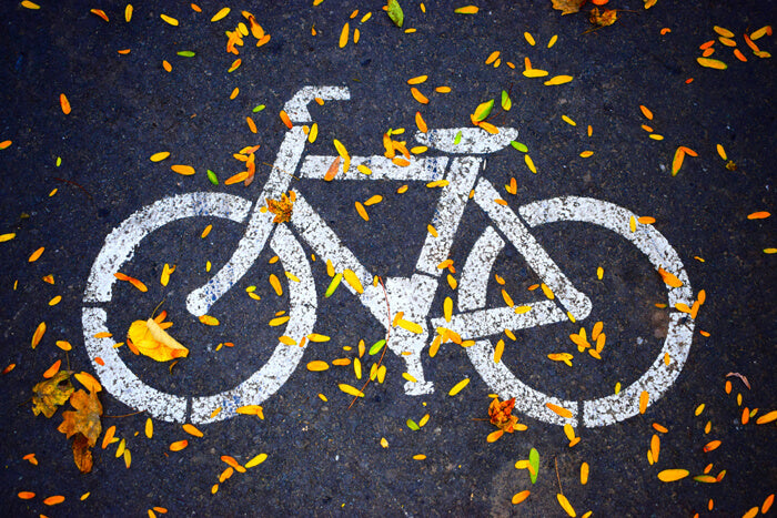 a bike pattern drawn with white lines on the road