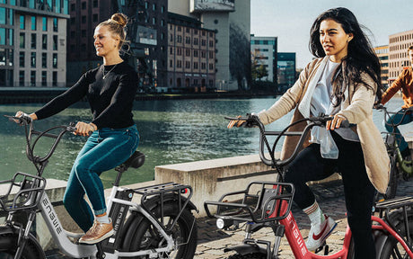 2 girls riding 2 engwe ebikes