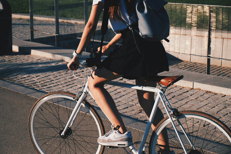 a girl riding a bicycle