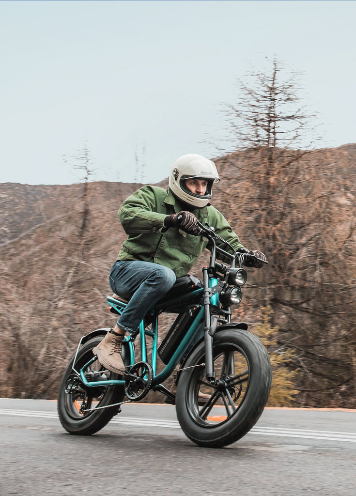 a man rides a green engwe m20 electric bike