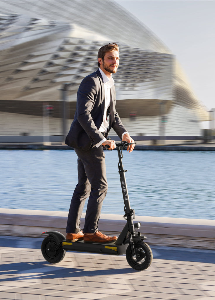 A man rides an engwe s6 electric scooter